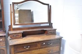 An Edwardian mahogany 'matched' two piece bedroom suite comprising marble top wash stand and