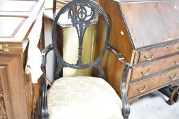 An early 20th Century stained frame carver chair