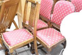 A harlequin set of six early 20th Century oak dining chairs