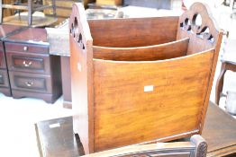 A mahogany and ply magazine rack, width approx. 39cm