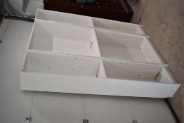 A quantity of white laminate tall shelving