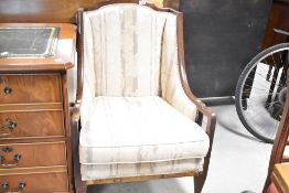 An early 20th Century mahogany framed easy chair , having later upholstery