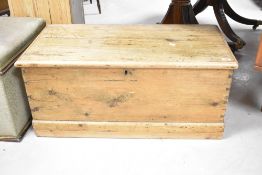 A 19th Century stripped pine bedding chest, with internal candle section, dimensions approx. W93cm