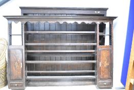 A period oak dresser top having open style back, dimensions approx. W191 H122 D23cm and a period oak