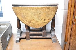 A nice quality period style gateleg occasional table, opening to an oval top, approx 75cm x 50cm,