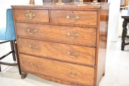 A 19th Century mahogany chest of two over three drawers, having brass drop handles, dimensions