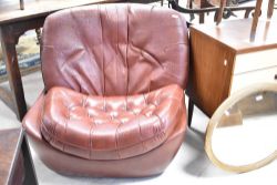 A vintage brown leather egg style easy chair, probably Namco, missing base, full re-upholstery