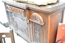 A Victorian mahogany breakfront sideboard, width approx. 150cm