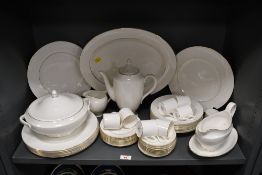 A selection of 20th-century Wedgwood bone china 'Signet Gold' tableware, to feature a lidded tureen,