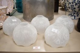 Five early to mid 20th-century frosted glass shades, of orbed form with scalloped rim detailing,