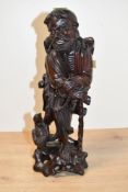 Thought to be early to mid 20th-century Chinese carved hard wood decorative immortal figure,