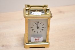 A mid to late 20th-century Fema of London 11 Jewels brass 5 glass carriage clock, marked to back