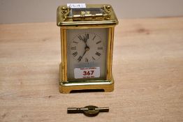 A late 19th to early 20th-century French 'R and C' brass 5 glass carriage clock, having Roman