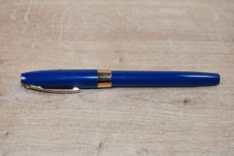 A Sheaffer Imperial cartridge Converter fill fountain pen in dark blue having Sheaffer 23ct