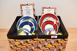 Two late 20th-century Clarice Cliff Bizarre teacup, saucer and side plate sets by Wedgwood, to