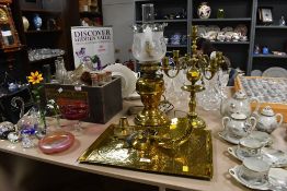 A selection of 20th-century brassware, to feature a four armed candelabra, an Edwardian-style oil