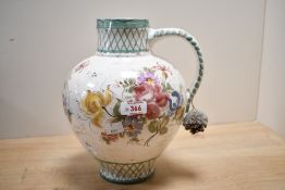 A mid 20th-century German Ulmer Keramik pottery ewer, of bulbous form, with a handle and flared rim,