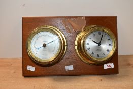 A vintage Simpson-Lawrence Limited of Glasgow brass 'Celeste' barometer and Yacht Alarm, upon a