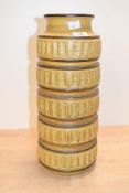A tall mid-century West German pottery floor vase, featuring five-bands of repeating geometric