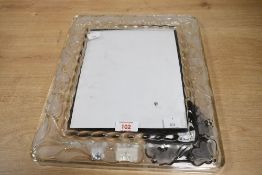 A large 20th-century Waterford crystal 'Marquis' photograph frame, featuring a delicate floral