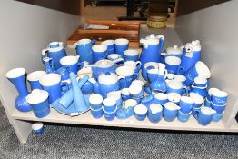 A large quantity of 20th-century Devon Blue Pottery, featuring various British town names, to