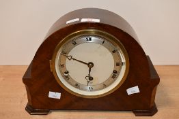 An early to mid 20th-century Elliott oak mantel clock, of domed form, with an 8-day mechanical