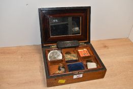 A 19th-century wooden marquetry inlaid jewellery box with contents, to feature a small EPNS vesta