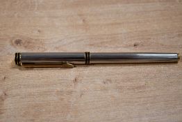 A Waterman Exclusive cartridge fill fountain pen in silver plated Godron pattern having Waterman