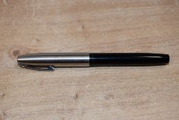 A Sheaffer Imperial cartridge / converter fill fountain pen in Black with brushed steel cap