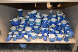 A selection of blue and white glaze motto wares, to include jugs, lidded pots, teapot, condiments
