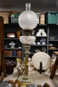 A tall Victorian James Hinks and Son of Birmingham oil lamp, featuring a delicately etched floral