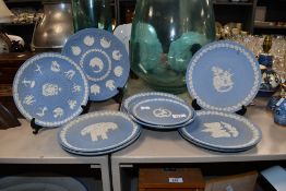 A selection of late 20th-century Wedgwood blue jasperware commemorative plates, to feature 'Montreal