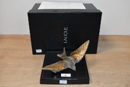 A 20th-century French Lalique Crystal Hirondelles Swallow Wall Ornament, featuring gilt-stamped