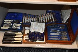 A large selection of 20th-century metal and EPNS cutlery sets, some marked but not all, (7 sets),