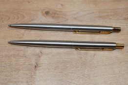 Two Parker 75 ballpoint pens in Flighter having gold trim