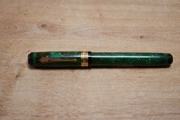Of pen collecting interest, an early 20th-century Waterman Patrician green marble fountain pen,