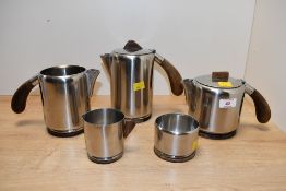 A mid 20th-century Danish Lundtofte stainless steel and rosewood tea and coffee service, designed