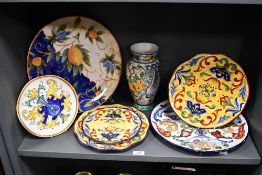 A quantity of 20th-century Maxcera Talavera-style hand-painted plates, to include three yellow
