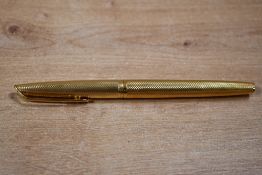 A Waterman Barleycorn converter fill gold plated fountain pen having 18k 750 nib