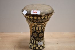 A small early 20th-century Egyptian handmade wooden doumbek, of goblet-form, featuring marquetry