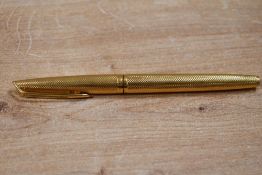 A Waterman Barleycorn cartridge fill gold plated fountain pen having 18k 750 nib