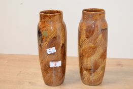 Two early 20th-century Royal Doulton stoneware 'Autumn Foliage' vases, featuring pressed leaf motifs