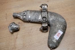 A 19th-century Omani white metal Khanjar ceremonial dagger, featuring intricate white metal mounts