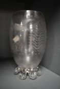 A small 19th-century engraved glass vase, having sweet fern motifs upon a pedestal base, unmarked,