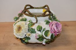 A Victorian Moore Brothers (1873–1905)-style vase, having intricate applied pink roses and