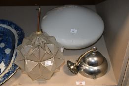 Two mid to late 20th-century glass light shades, to feature an orbed milk glass example and a star-