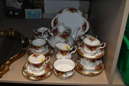 A 20th-century Royal Albert 'Old Country Rose' bone china part tea set, featuring a delicate rose