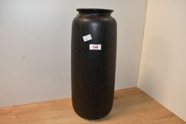 A tall mid 20th-century West German floor vase, featuring a speckled dark brown glaze, marked to