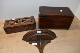 Two early to mid 20th-century hard wood boxes, to feature a hand carved example; sold with a