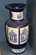 A large late 20th-century Brannam Gazebo ceramic floor vase, featuring a deep blue and cream glaze